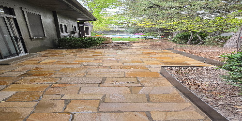 Patio with a built-in seating and cushions