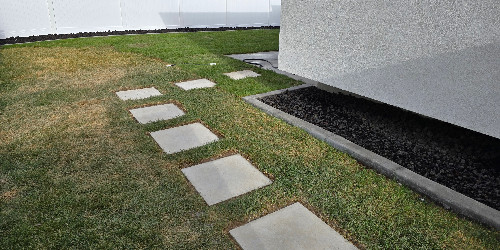 Custom paver design around a pool